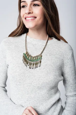 gold necklace with colored details