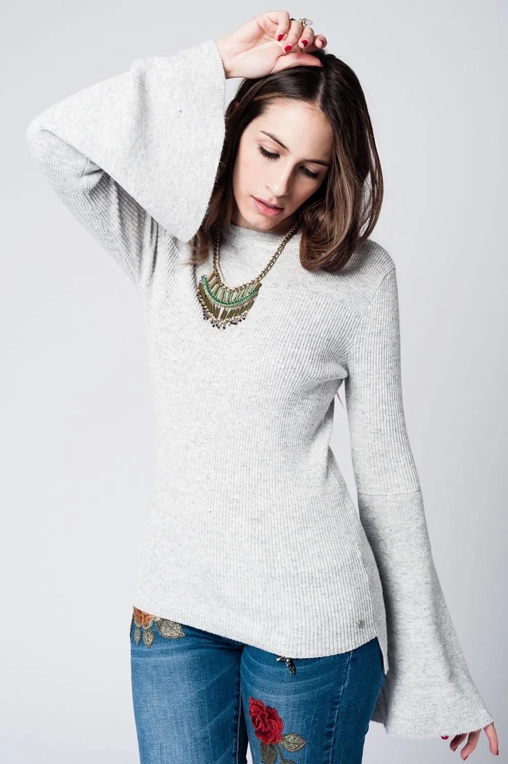 gold necklace with colored details