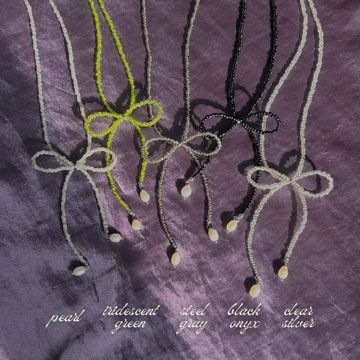 LILOU Gems Beaded Bow Necklace (Various Colours)
